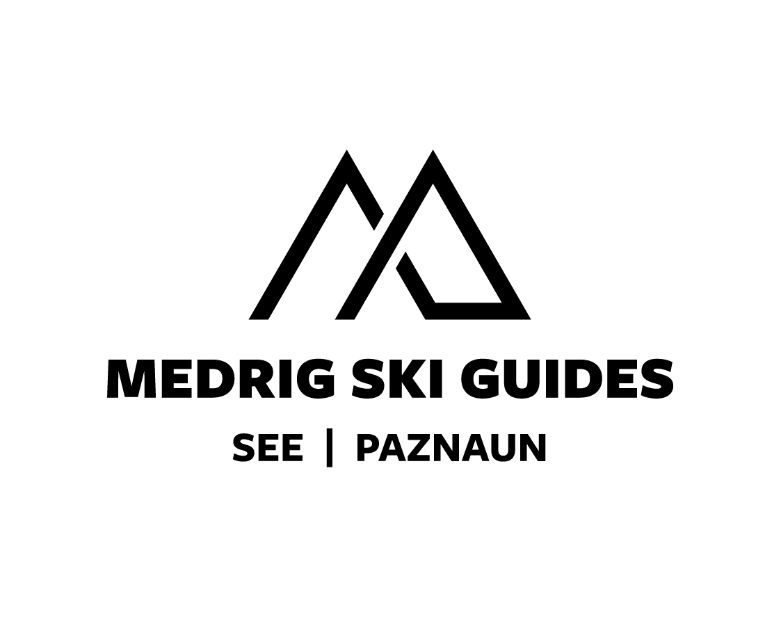 Logo mit stilisierten Bergen und Text: MEDRIG SKI GUIDES, SEE, PAZNAUN.